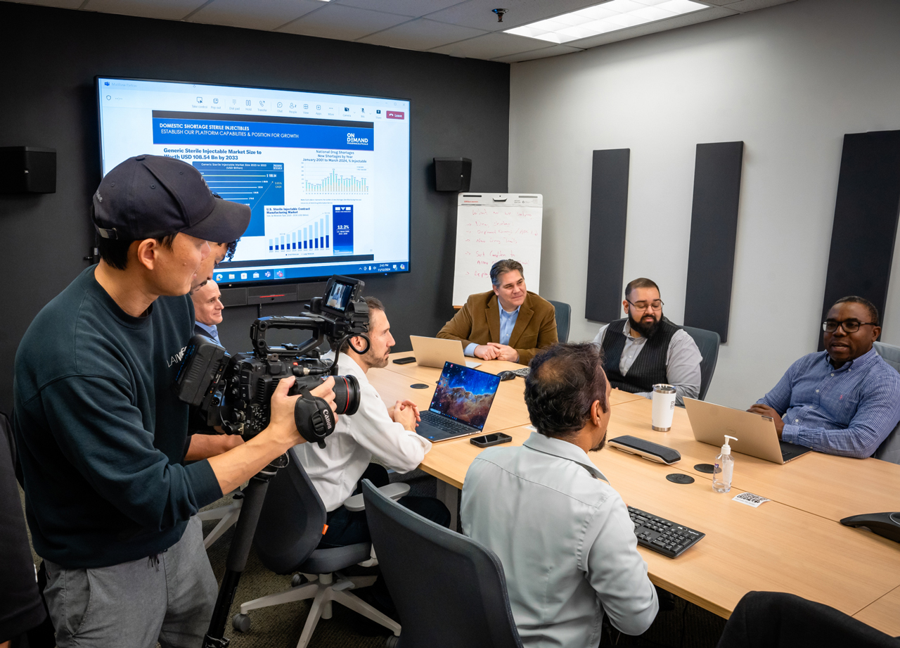 Actors In Conference Room Filming